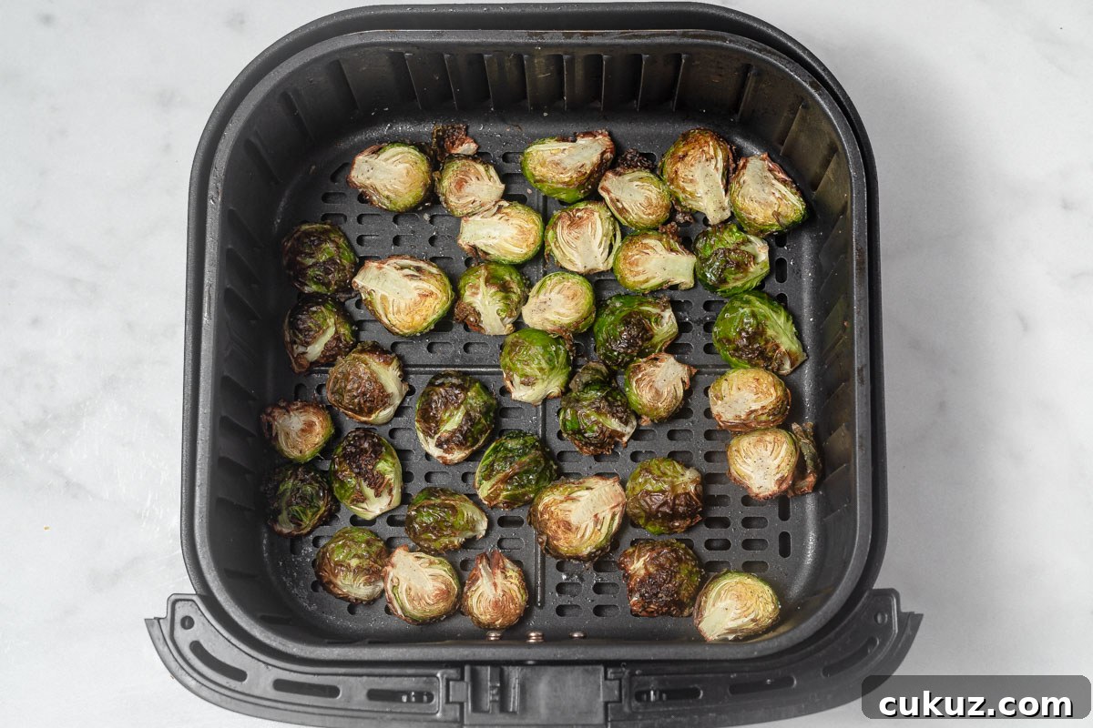 Crispy Air Fryer Brussels Sprouts with Balsamic Glaze 6 roasted crispy brussel sprouts in the air fryer