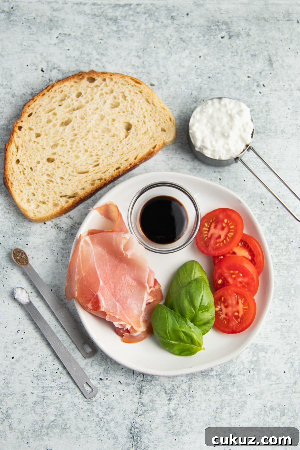 Picture of all ingredients for prosciutto tomato cottage cheese toast. 