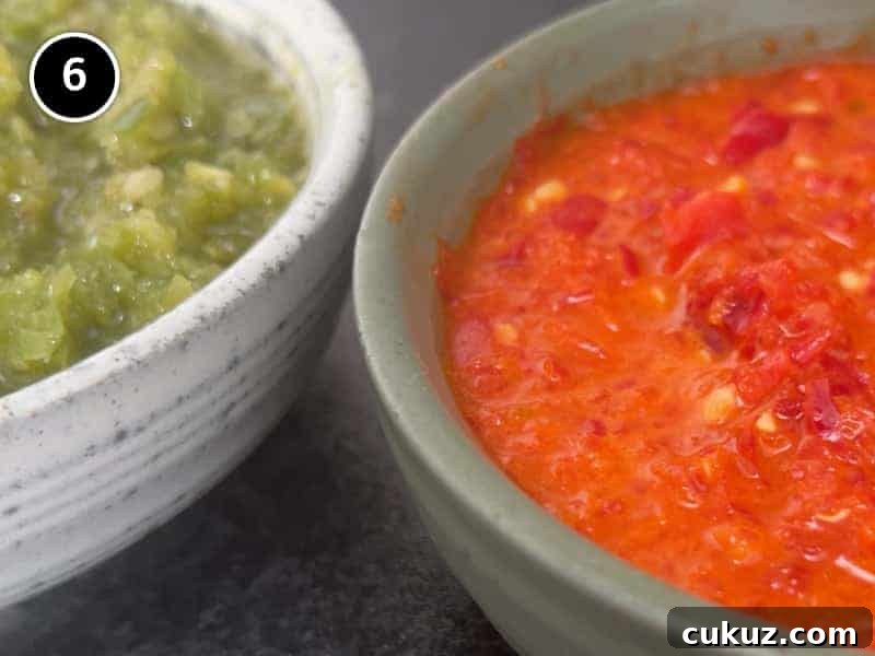 Two bowls of Middle Eastern Shatta Sauce. A red variety and green variety.