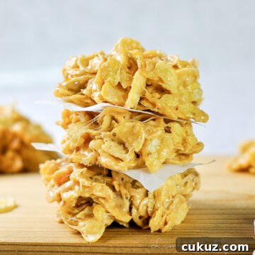 stack of no bake cookies on a cutting board.