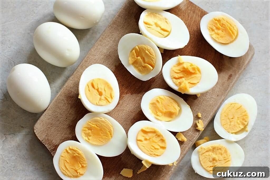 boiled eggs are halved for the quinoa bake