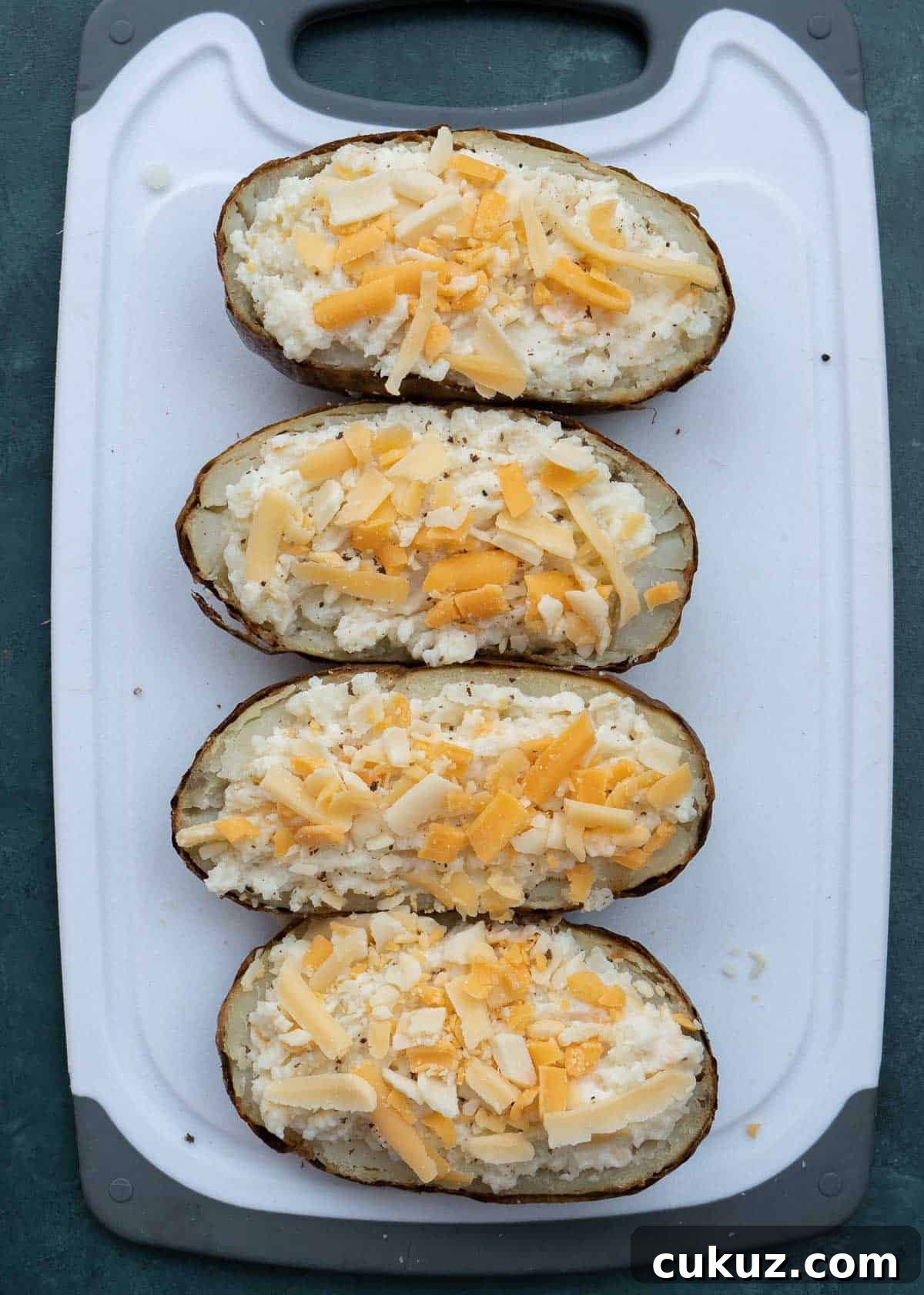 top with remaining shredded cheese