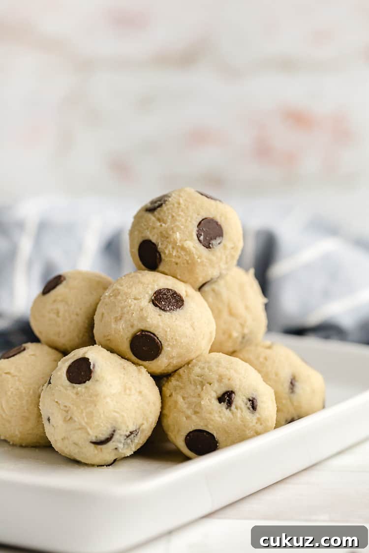 low carb gluten free keto cookie dough fat bombs with chocolate chips on serving dish