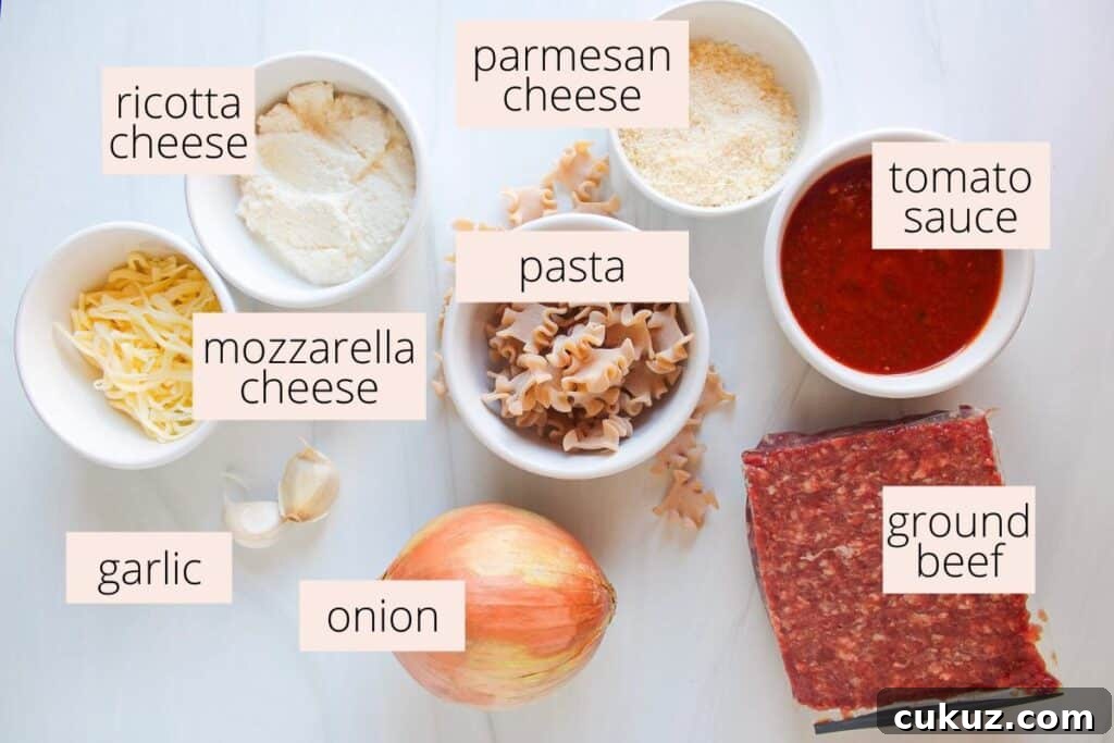Ingredients needed for deconstructed lasagna on a countertop in small bowls with labels.