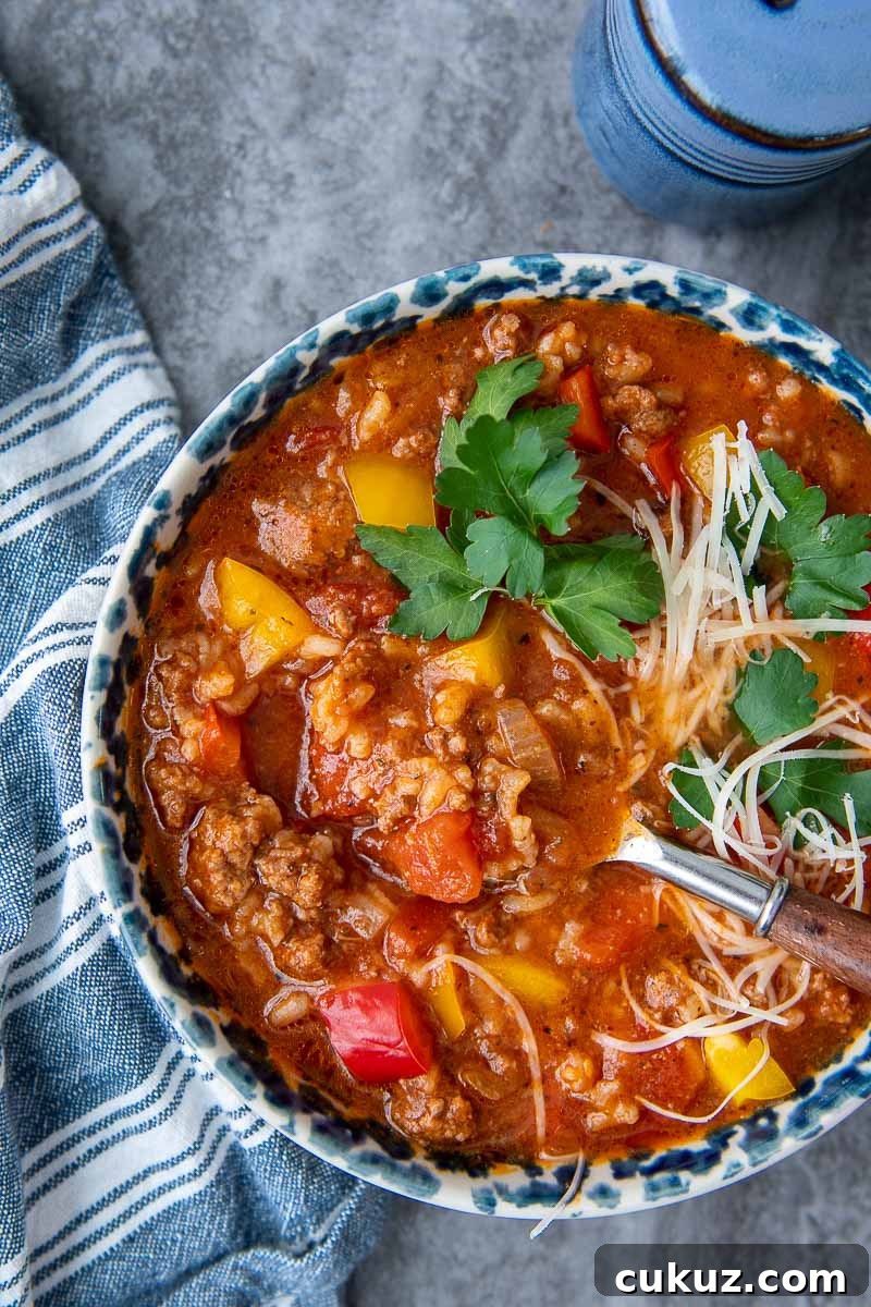 a spoon lifting out a bite of soup