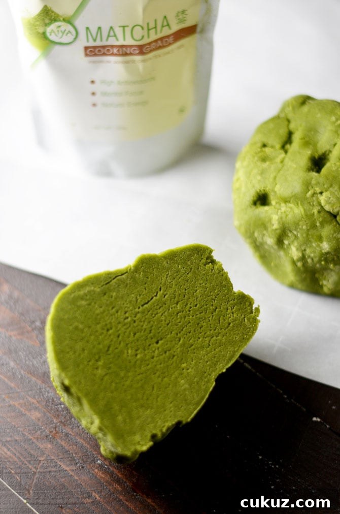 Matcha Cookie Christmas Tree Stacks. Buttery, sugary matcha green tea cookies make delicious Christmas gifts. Stack 'em up, sprinkle with powdered sugar, place an almond on top, and wrap them up in cellophane before passing them out as presents. | hostthetoast.com