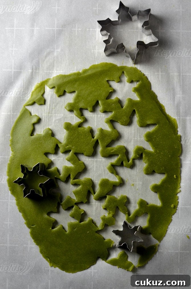 Matcha Cookie Christmas Tree Stacks. Buttery, sugary matcha green tea cookies make delicious Christmas gifts. Stack 'em up, sprinkle with powdered sugar, place an almond on top, and wrap them up in cellophane before passing them out as presents. | hostthetoast.com