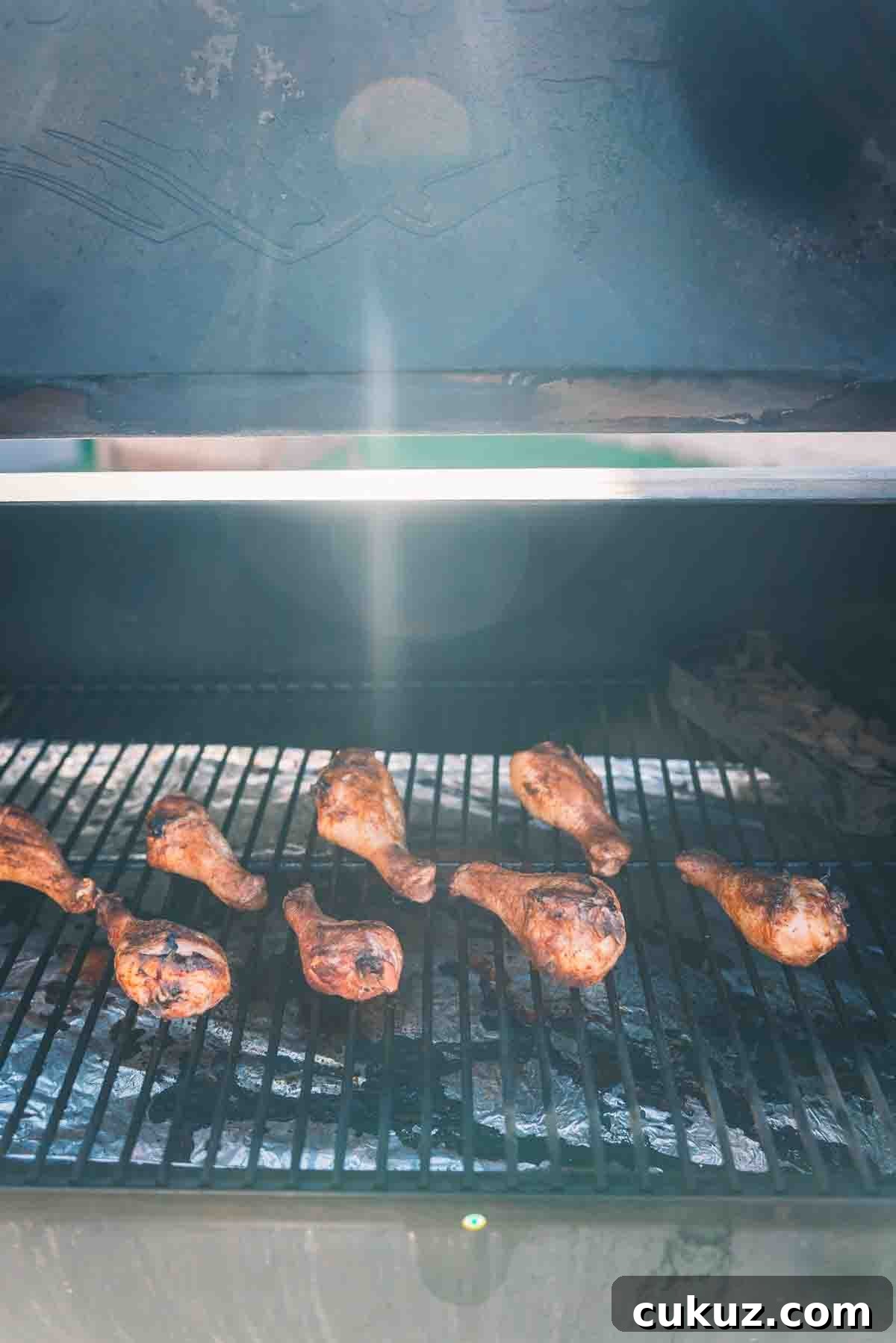 Chicken legs on a pellet grill.