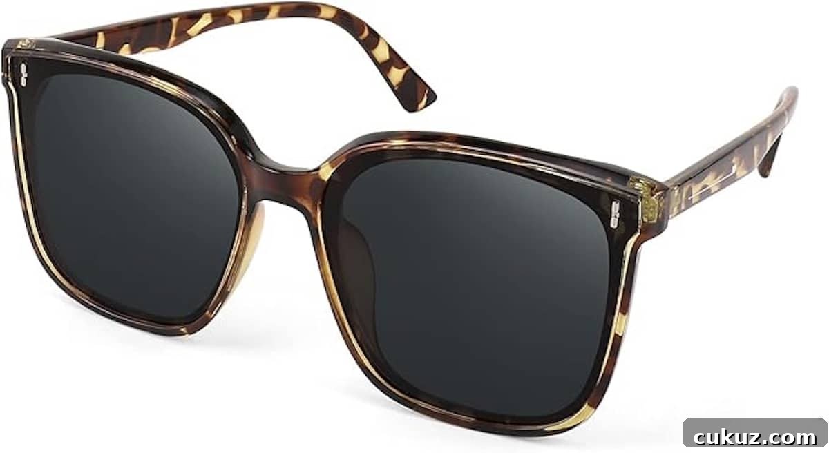 Tortoiseshell square-frame sunglasses with dark lenses, perfect for exploring the epic universe in July, displayed on a white background.