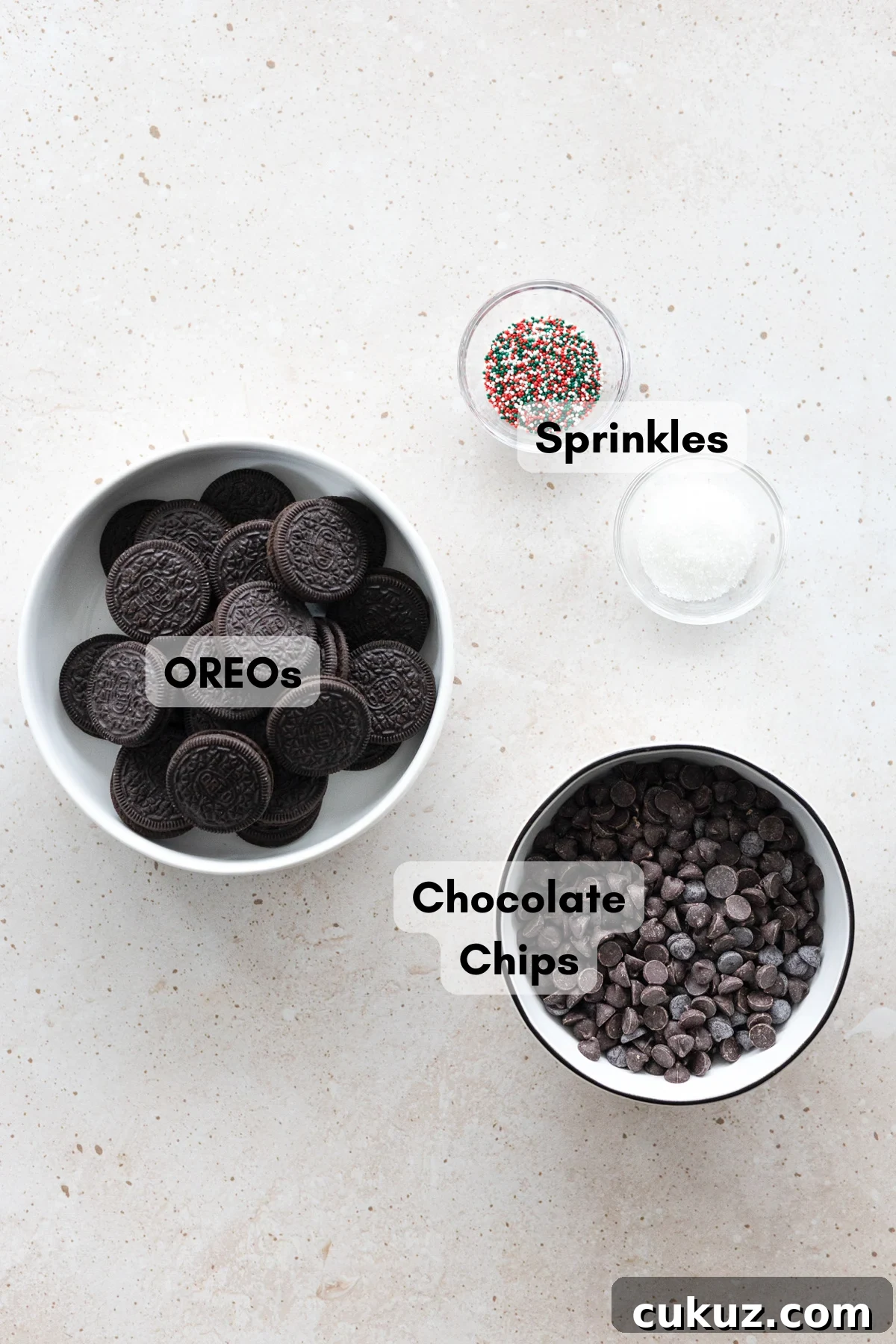Ingredients for Chocolate Covered OREOs in small bowls. 