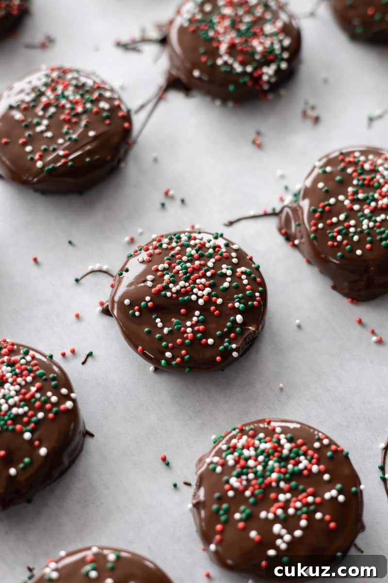 Sprinkles on top of the chocolate coated cookies. 