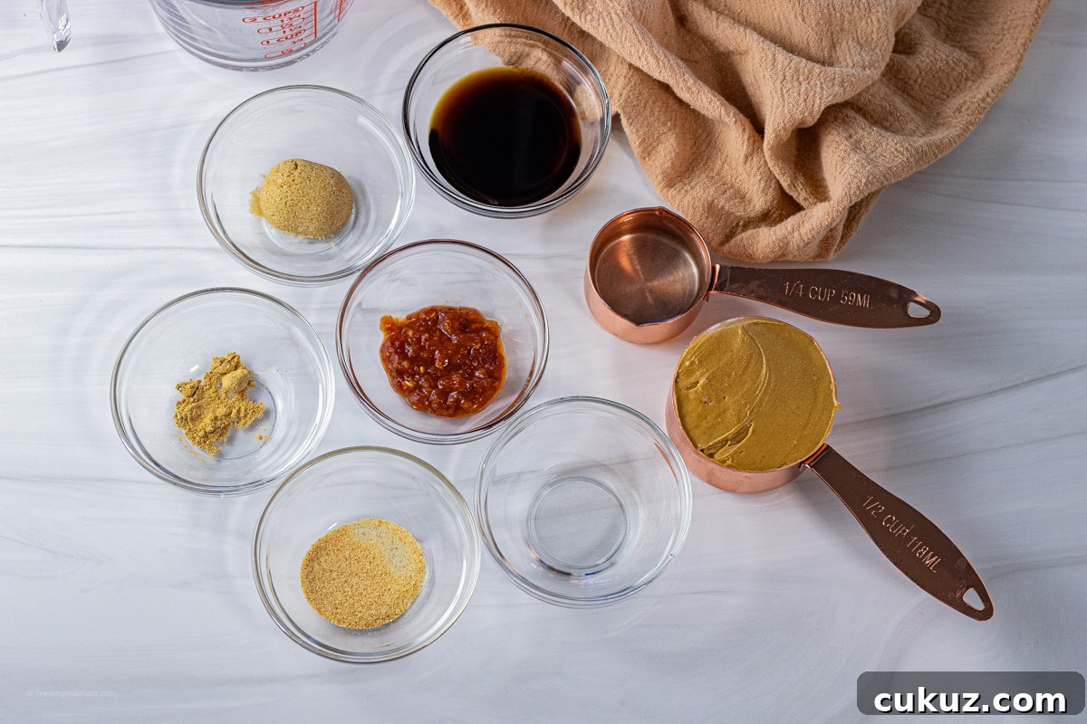 Creamy Peanut Dipping Sauce Recipe for Asian-Inspired Dishes 3 small bowls of ingredients to make a peanut butter sauce
