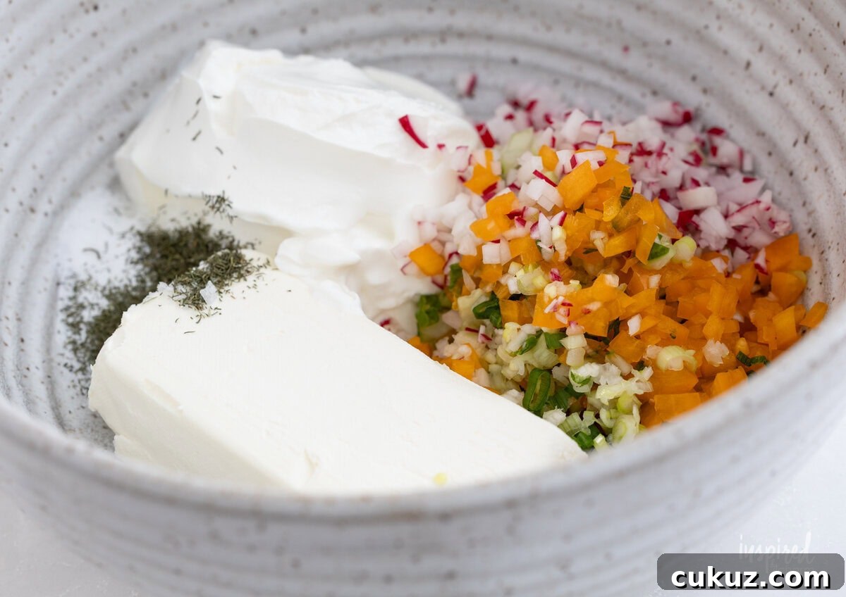 ingredients for creamy garden vegetable dip in a bowl.