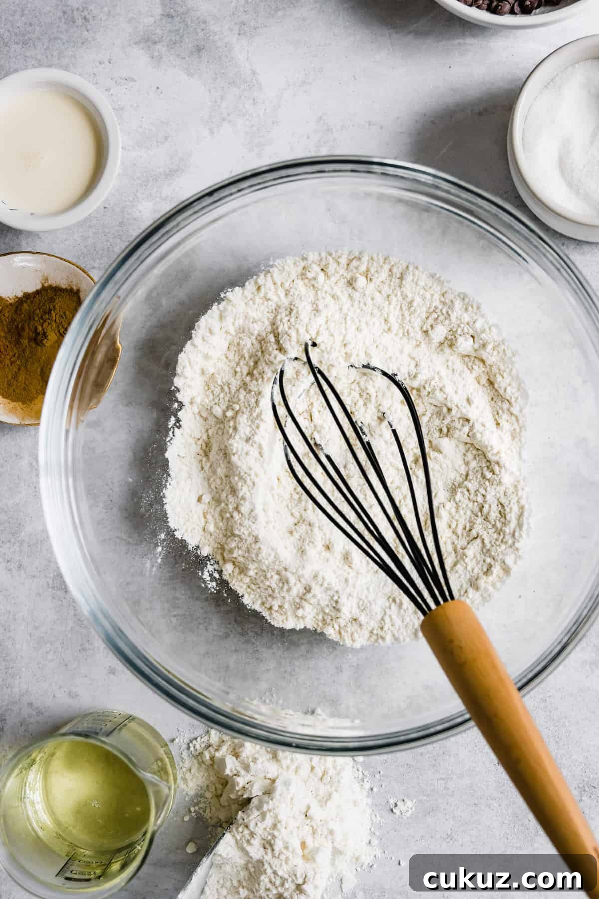 How to Make Crispy Homemade Churros with Chocolate Dipping Sauce 4 A Glass Bowl Filled with the Combined Dry Ingredients for Homemade Churros