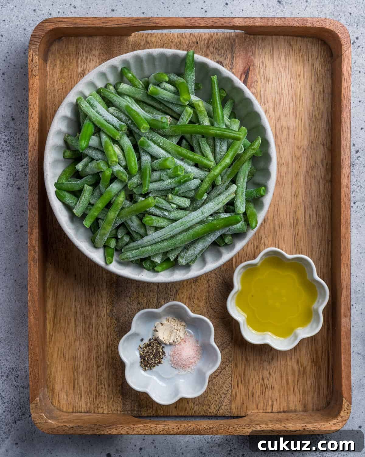 Photo showing the ingredients to make air fried frozen green beans.