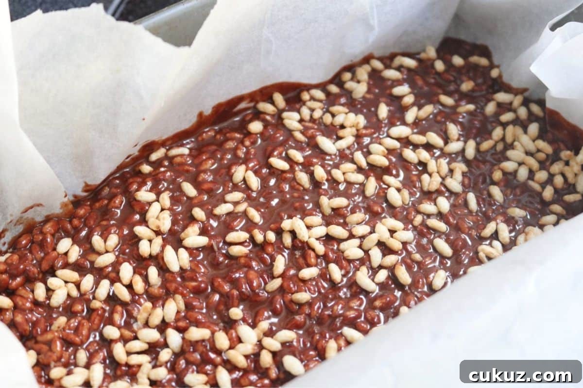 Dark chocolate crunch bars in a baking loaf.