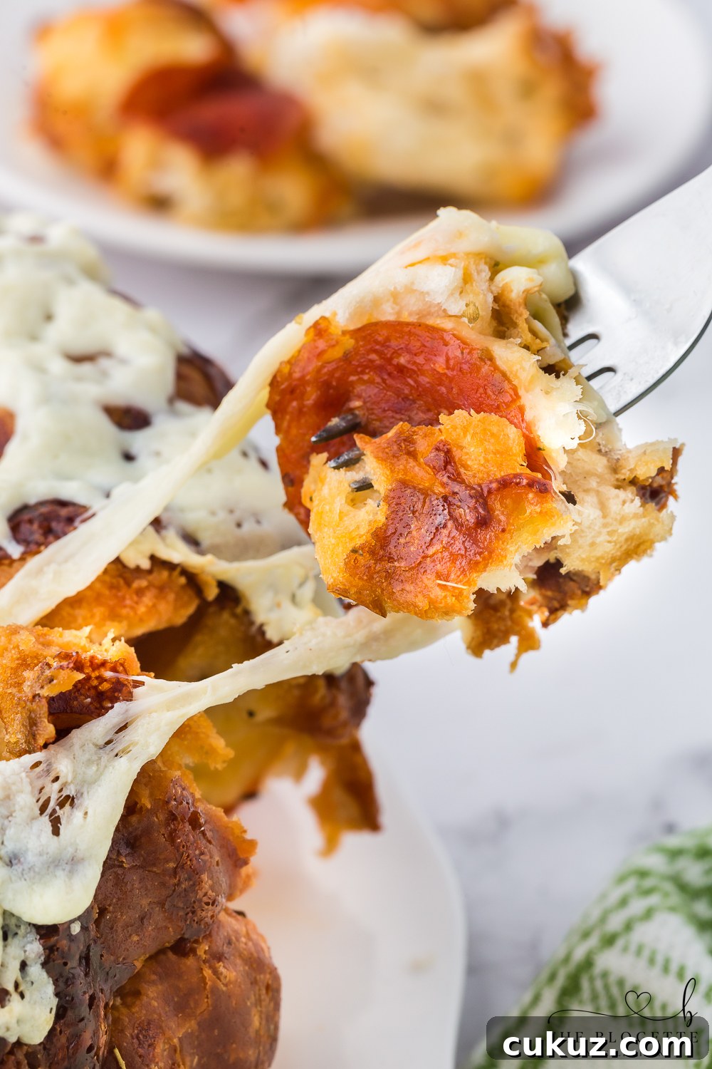 Easy Pull-Apart Pizza Bread! It has the perfect combination of melted cheese and pepperoni.