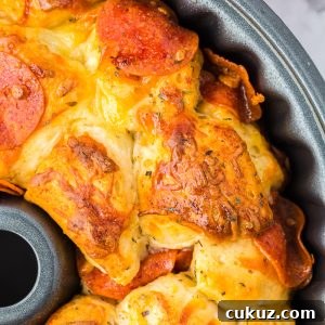 Easy Pull-Apart Pizza Bread! It has the perfect combination of melted cheese and pepperoni.