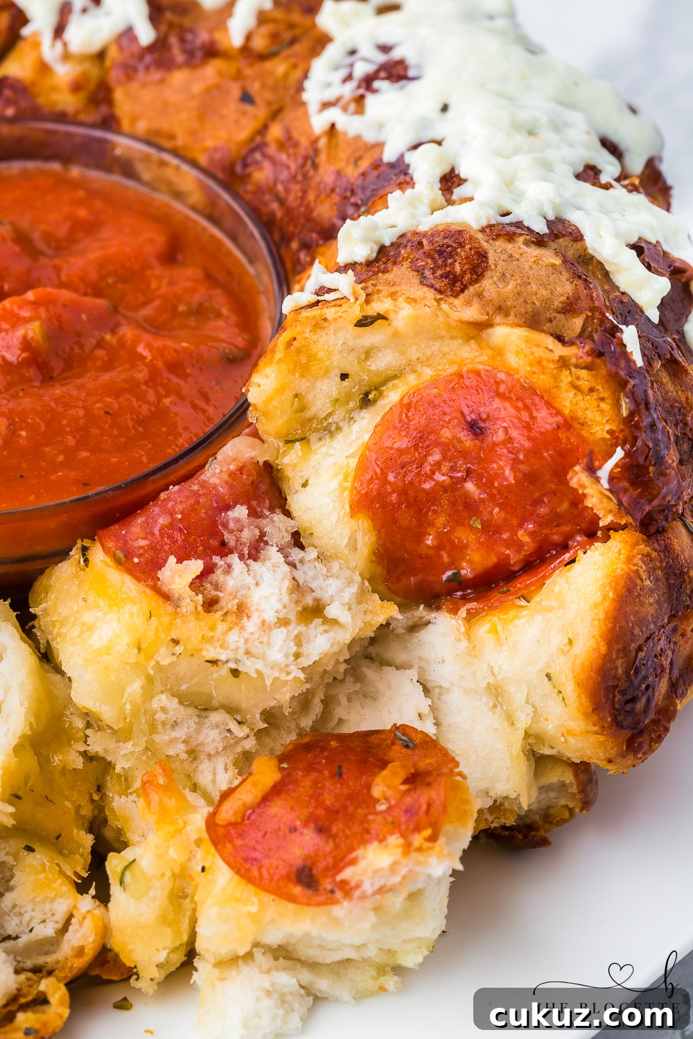 Easy Pull-Apart Pizza Bread! It has the perfect combination of melted cheese and pepperoni.