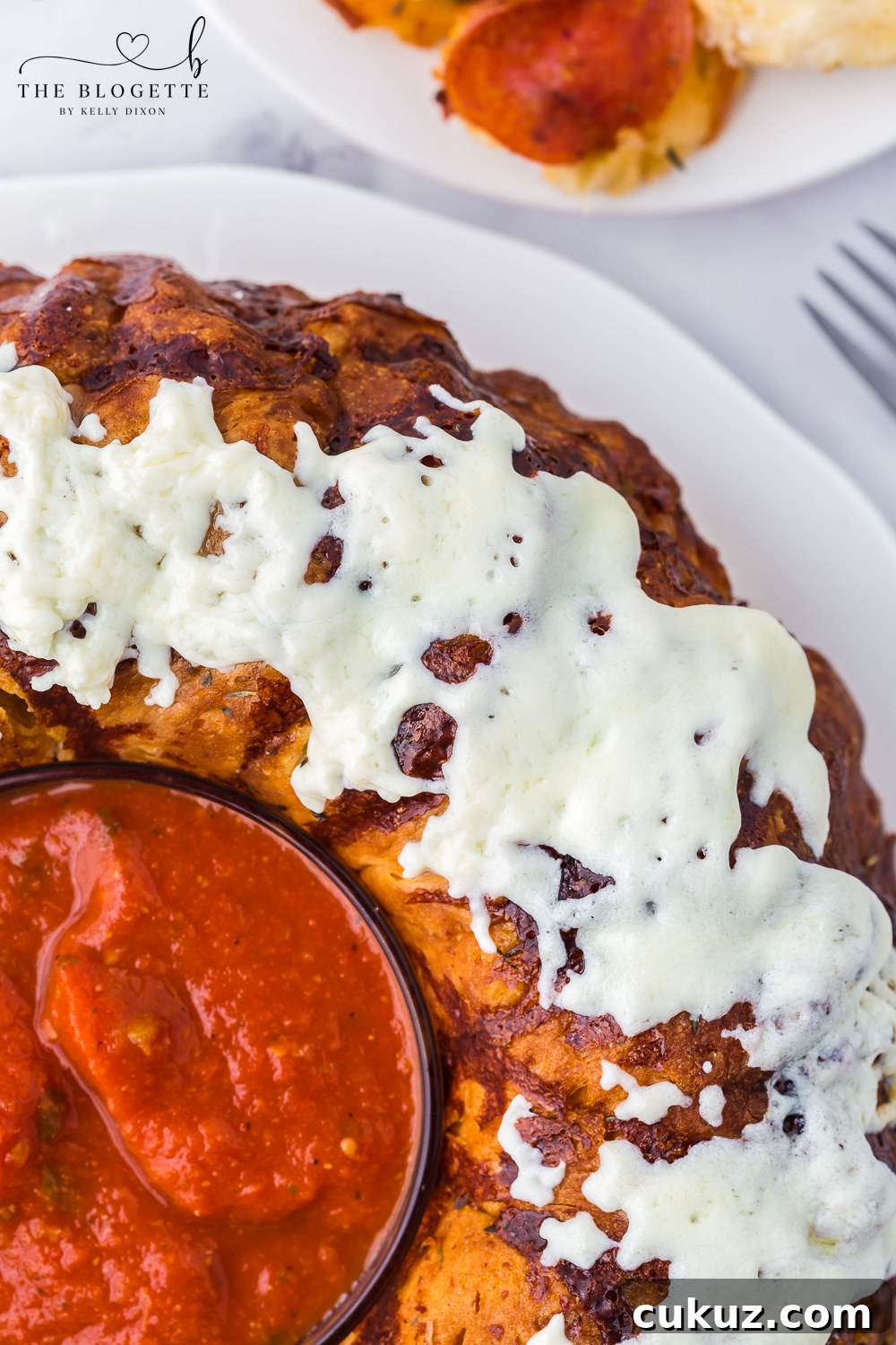 Easy Pull-Apart Pizza Bread! It has the perfect combination of melted cheese and pepperoni.