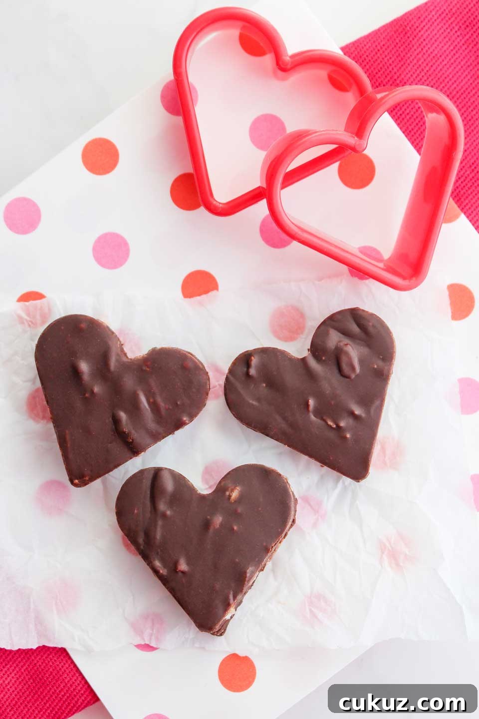 Three fudge hearts cut with cookie cutters for Valentine's Day