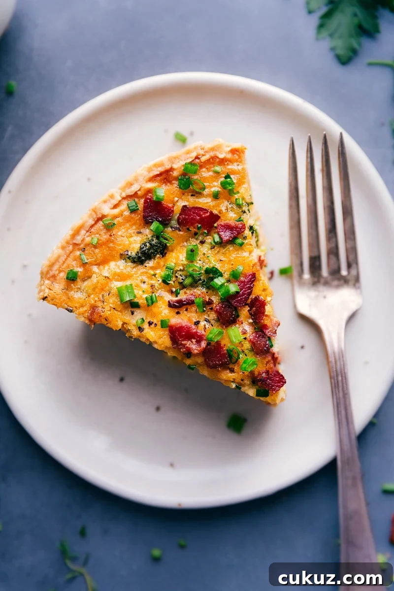 Overhead image of a slice of Broccoli Cheddar Quiche.