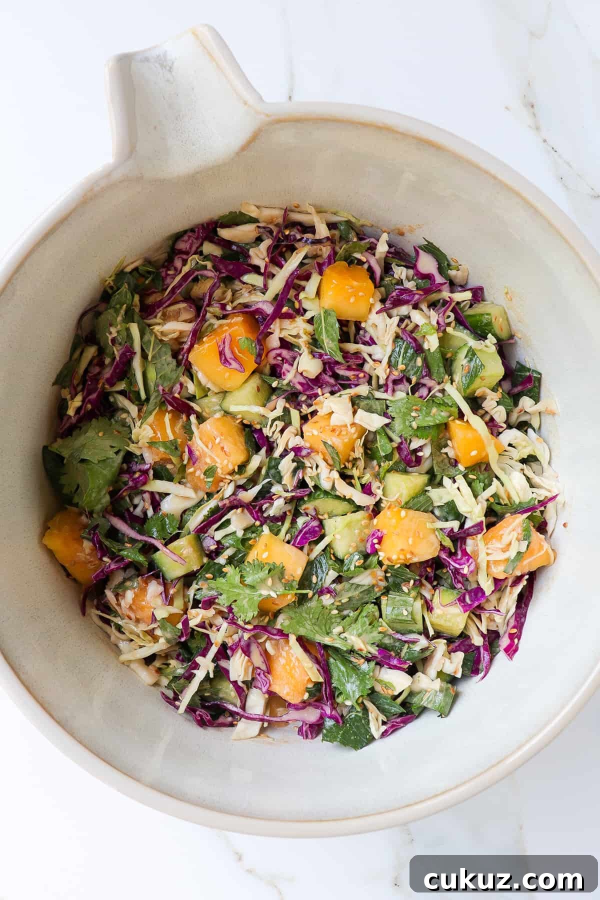 Mango salad in bowl.