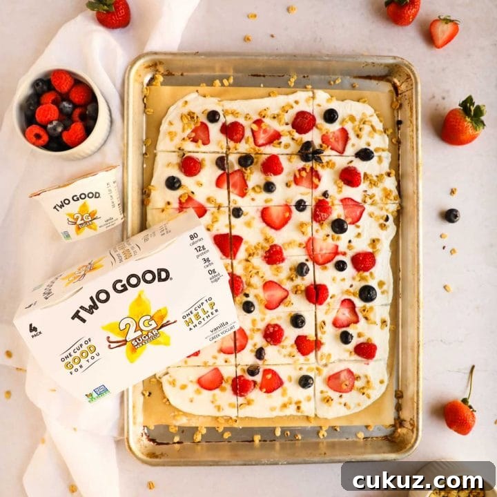 Frozen Yogurt Bark with Berries and Granola flatlay.