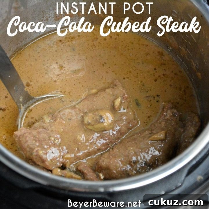 Served cola cubed steaks with creamy mushroom sauce over mashed potatoes.