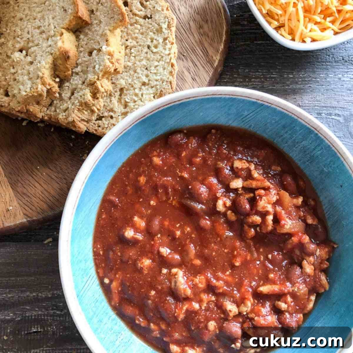 Weight watchers turkey chili with cheese and bread. 