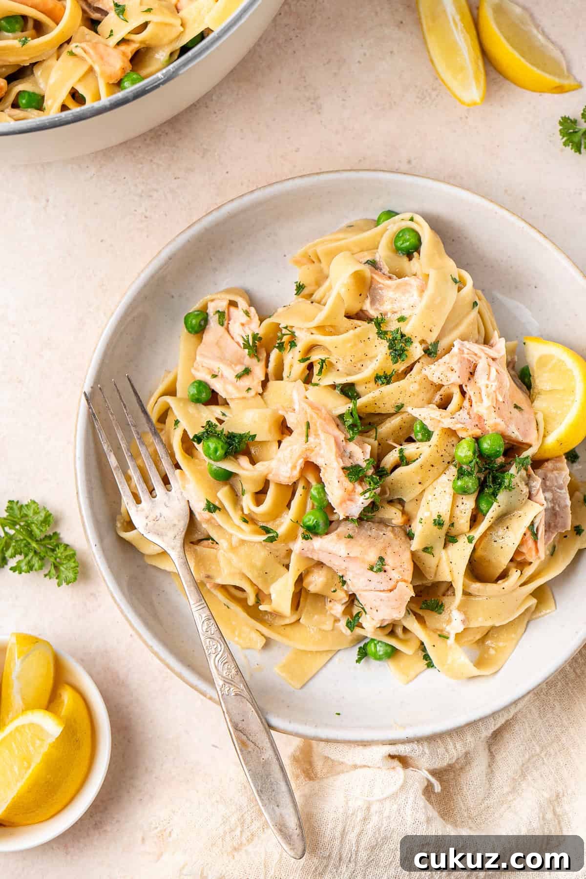 Creamy Dairy-Free Salmon Tagliatelle Recipe 4 Close up of the creamy salmon pasta with a fork.
