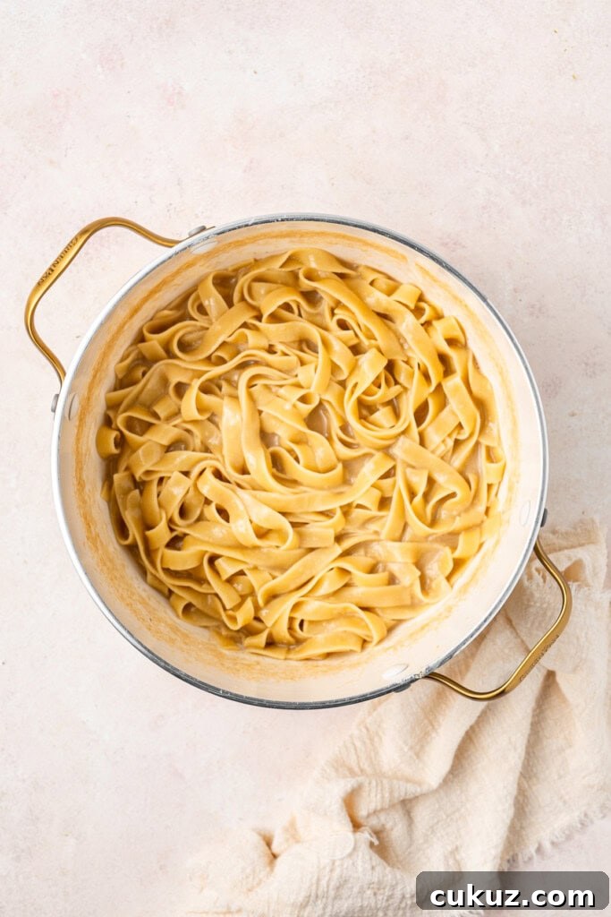 Creamy Dairy-Free Salmon Tagliatelle Recipe 8 The finished pot of cooked, creamy pasta.