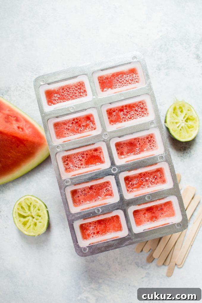 watermelon margarita popsicles in a tray