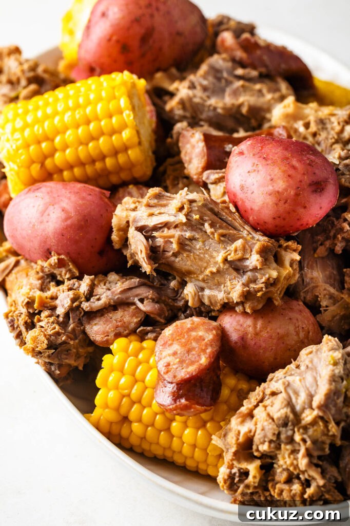 Cajun Turkey Neck Boil with Smoked Sausage, Potatoes & Corn 2 plate of cajun turkey neck boil with smoked sausage, potatoes and corn