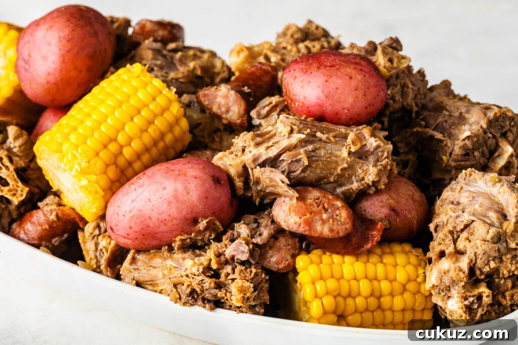 Cajun Turkey Neck Boil with Smoked Sausage, Potatoes & Corn 4 plate of cajun turkey neck boil with smoked sausage, potatoes and corn
