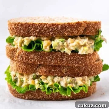 Sandwich filled with the chickpea salad and lettuce