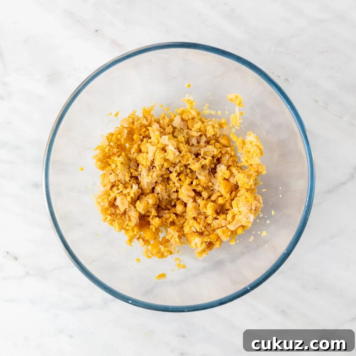 Mashed chickpeas in a bowl