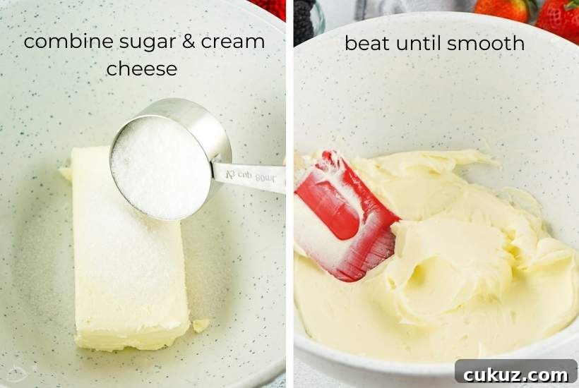 Summer Berry Cheesecake Salad Recipe with Creamy Whipped Topping 4 cream cheese and sugar being mixed together