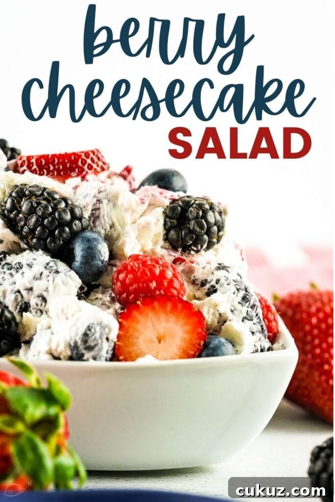 Summer Berry Cheesecake Salad Recipe with Creamy Whipped Topping 9 berry cheesecake salad in a bowl with text overlay