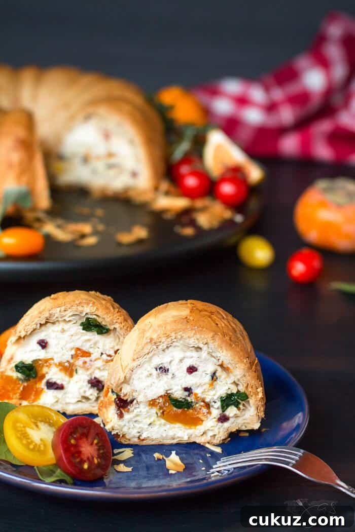 Slices of fillo ricotta bundt pie with butternut squash and spinach
