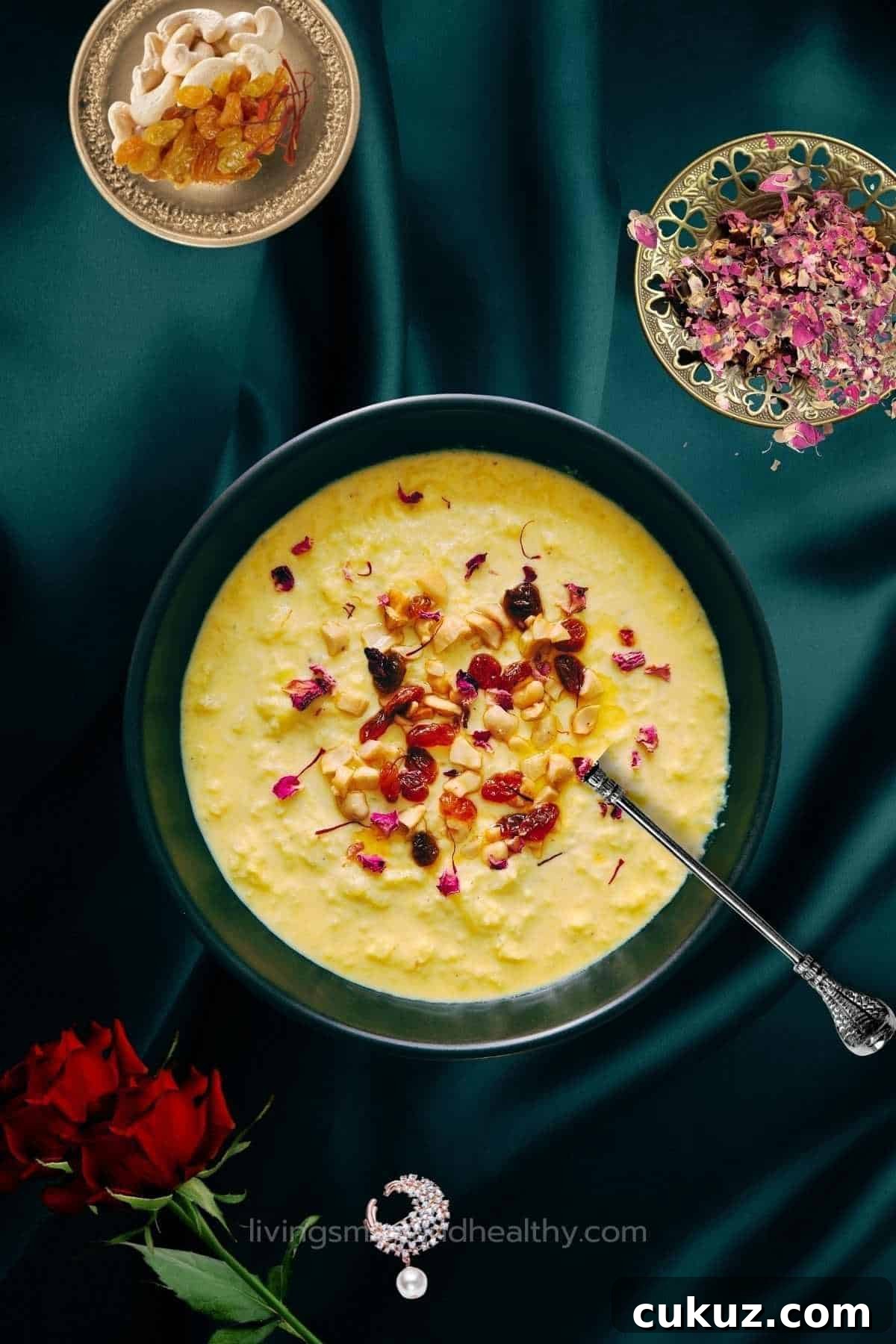 lauki ki kheer served in a big black bowl garnished with rose petals and nuts