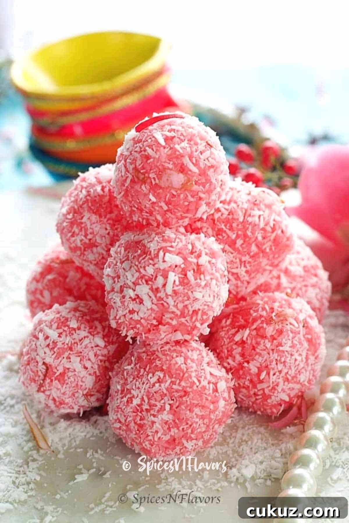 rose ladoo stacked like a pyramid on marble slab