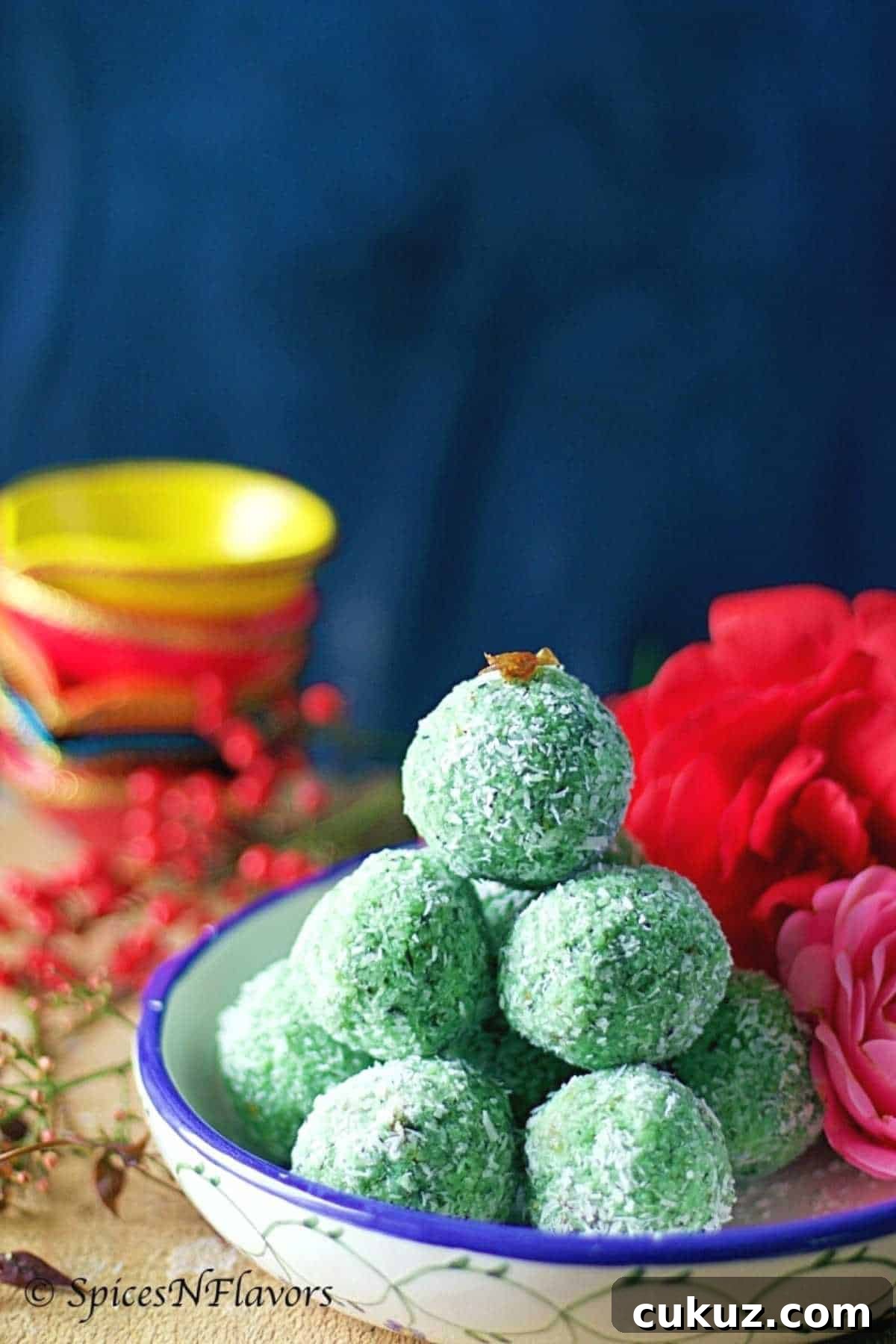 paan laddu stacked like a pyramid placed over a blue and white bowl