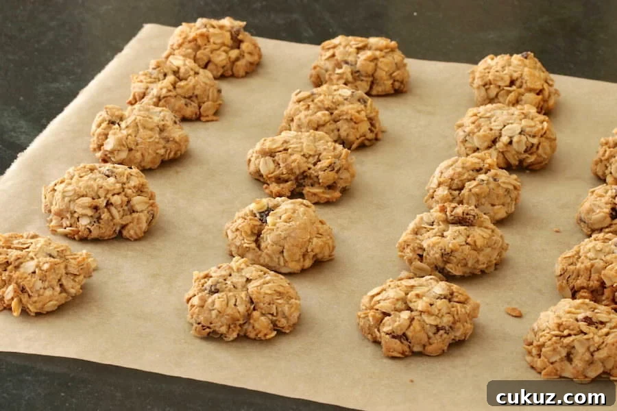 Baked maple nut cookies on parchment paper