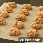 Baked maple nut cookies on parchment paper
