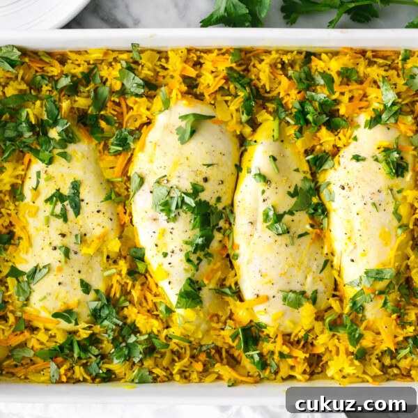 A dish filled a turmeric chicken and rice casserole