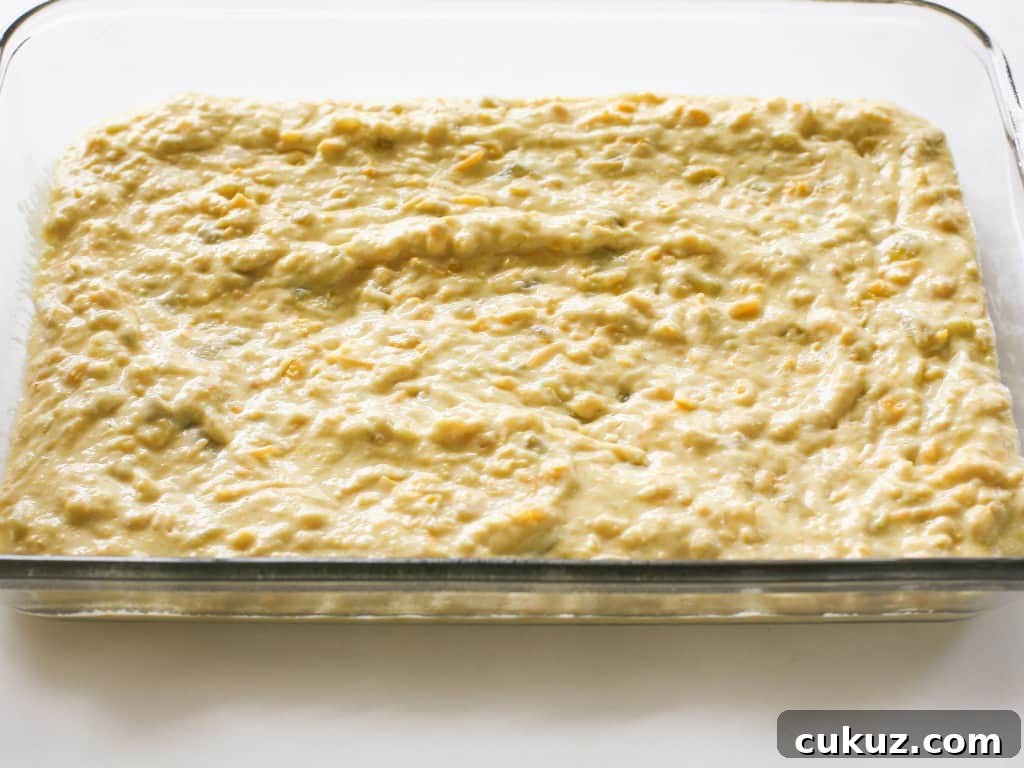Chicken Tamale Casserole Recipe: Cheesy Mexican-Style Bake 4 Mixing cornbread crust ingredients