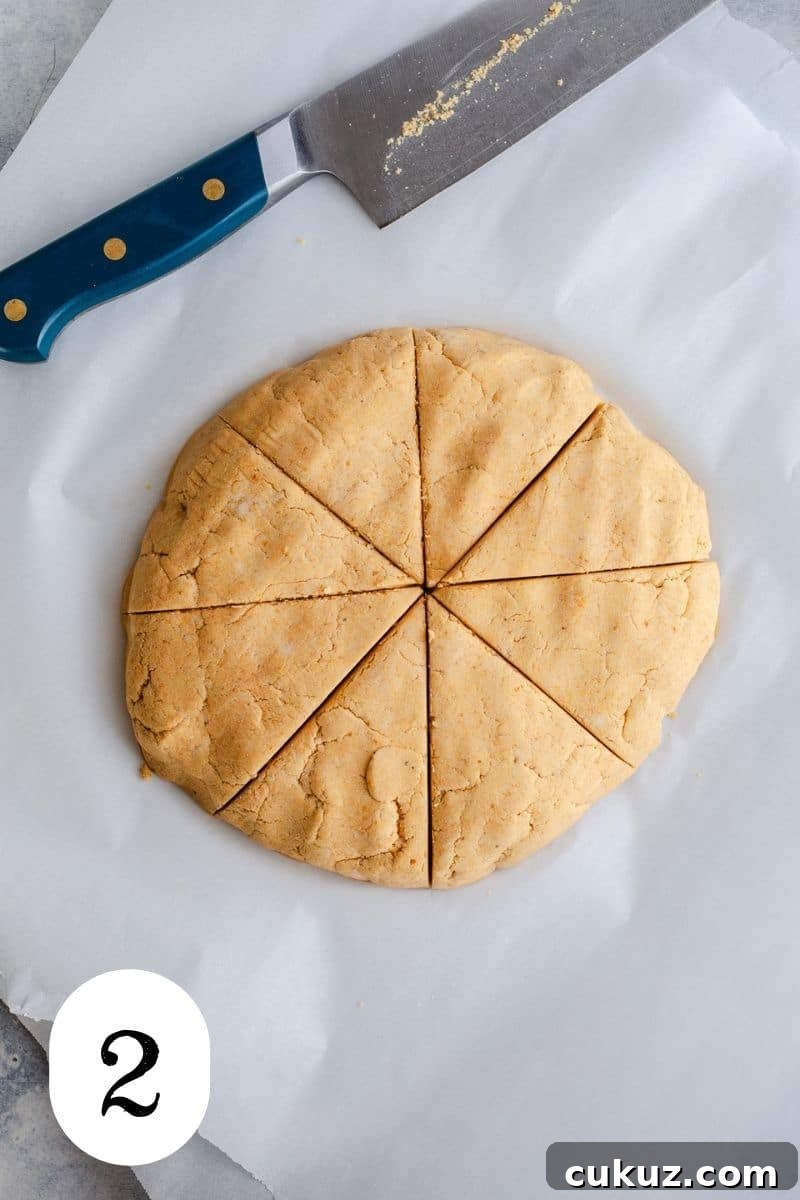 Dough sliced into eight wedges.