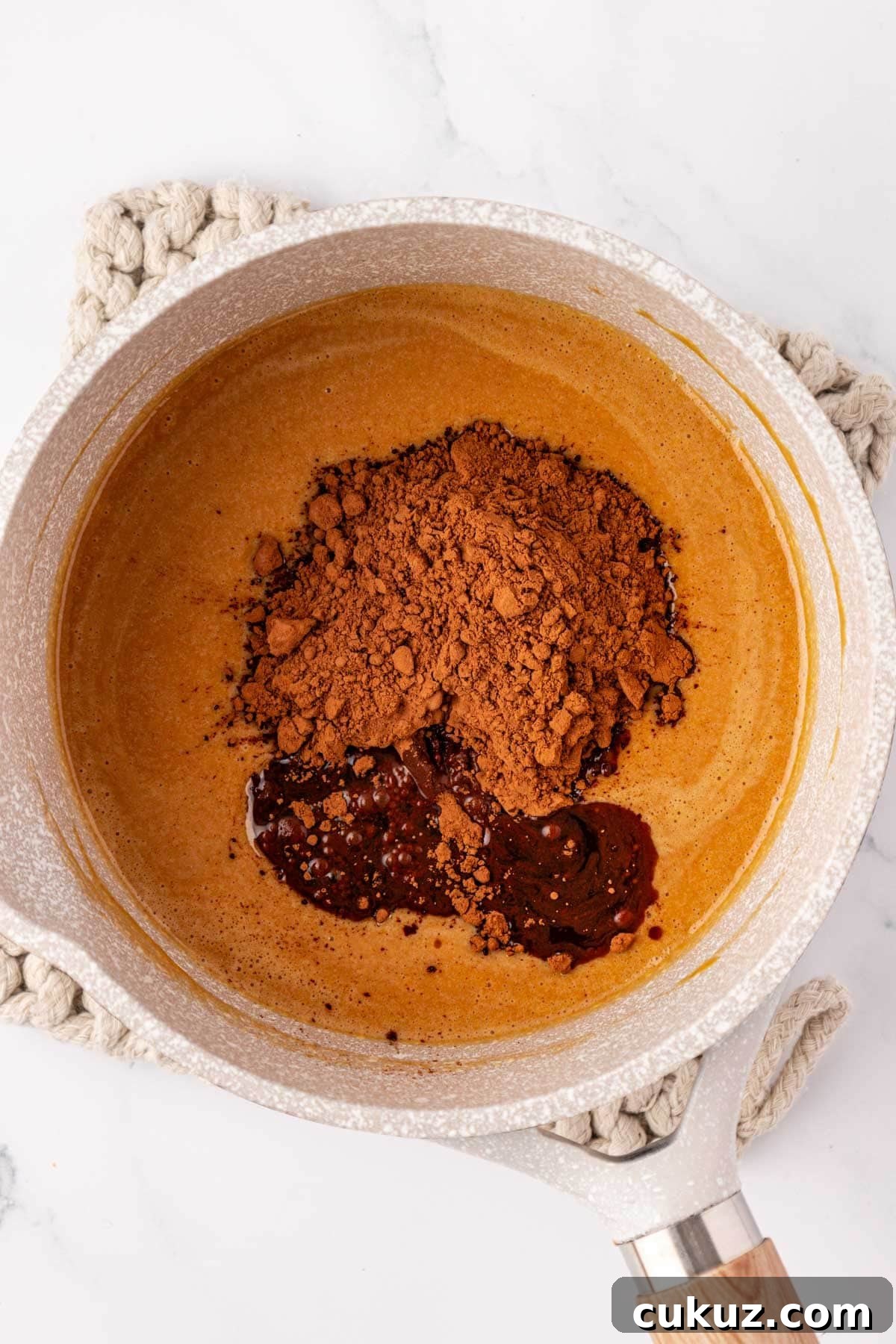 Adding cacao powder